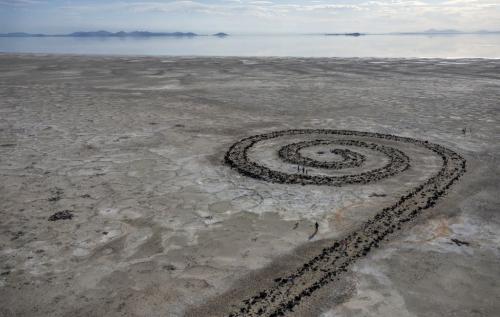 (Leah Hogsten | The Salt Lake Tribune) People explore the Spiral Jetty, just south of the Rozel Point peninsula on the northeastern shore, March 25, 2022.